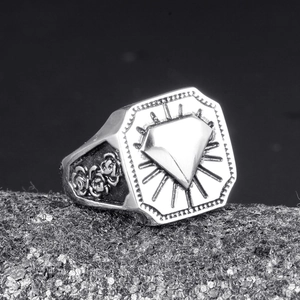 Macro detail of vintage octagonal silver steel ring with rose flower carvings
