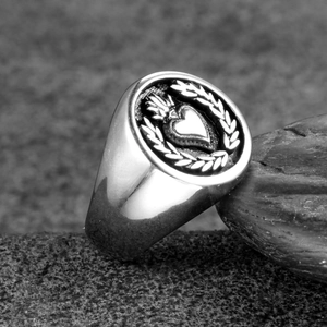 Vintage stainless steel signet ring with heart and laurel wreath engraving