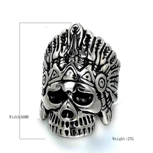 Macro detail of gothic skull ring with Indian feather headdress and antique finish