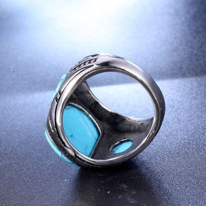 Polished stainless steel men's ring with turquoise stone inlay and engraved sides
