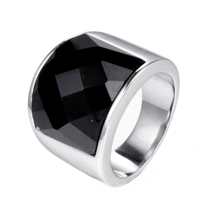 Mens vintage stainless steel ring with large faceted black gemstone on white background
