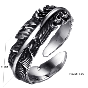 Detailed macro view showing the 8.3mm width and vintage feather texture of the steel ring