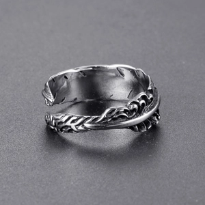 Retro stainless steel feather ring with vintage adjustable design and detailed carving
