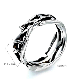 Detail view of retro silver thorn vine ring showing 24mm width and adjustable design