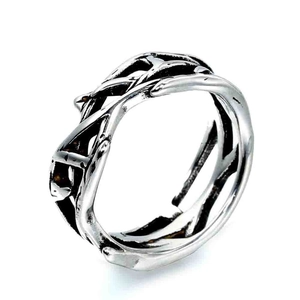 Minimalist silver vine ring with polished thorny texture and adjustable open band