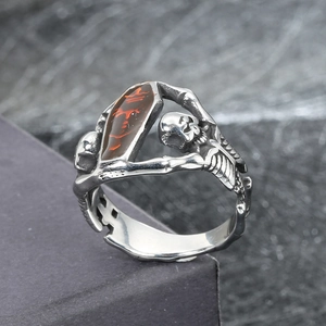 Gothic vampire coffin ring with silver skeleton band and red stone inlay for men