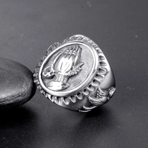 Gothic punk men's stainless steel signet ring featuring praying hands and wing relief
