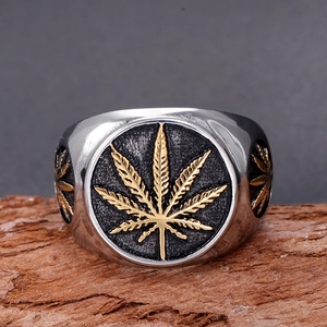 Polished stainless steel men's maple leaf ring with gold relief on black sandblasted face