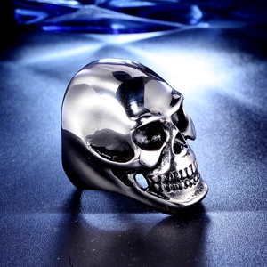 Polished stainless steel skull ring with vintage silver finish in gothic style