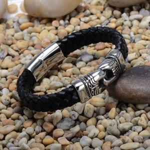 Men's black braided leather bracelet with silver totem buckle on natural stones