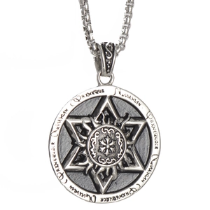 Macro detail of vintage hexagram star pendant with engraved sunburst and occult runes