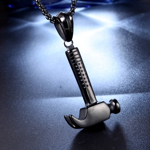 Close-up of industrial black hammer pendant on a matching square pearl chain