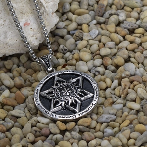 Vintage silver sunburst star pendant necklace with embossed flame motifs and box chain
