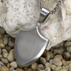 Brushed 316L stainless steel shield pendant with heavy duty box chain on stones