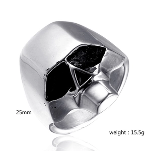 Detail view of silver skull ring showing 25mm front width and 15.5g product weight