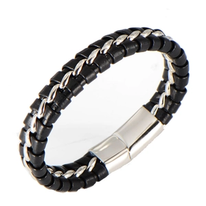 Macro view of woven black leather bracelet with polished silver magnetic clasp closure
