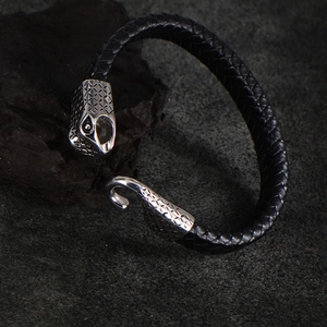 Vintage punk snake head bracelet in black braided leather with silver metal texture