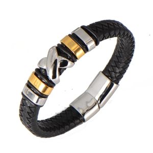 Detail of black braided leather bracelet with silver X-shaped buckle and metal clasp