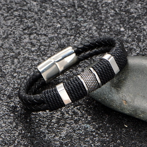 Men's black braided leather bracelet with silver stainless steel magnetic clasp detail