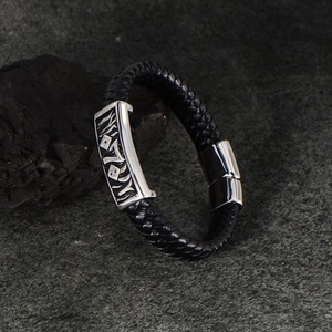 Braided leather bracelet with vintage engraved stainless steel magnetic clasp on stone