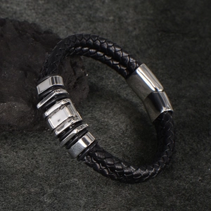 Men's minimalist black braided leather bracelet with silver stainless steel magnetic clasp