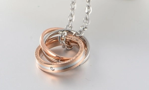 Halskette mit drei ineinandergreifenden Ringen in Roségold und Silber mit Zirkon