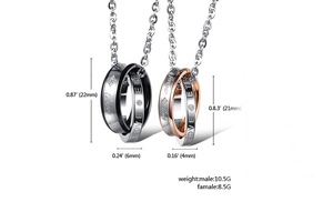 Detail view of double-ring titanium necklaces for couples with LOVE ETERNITY engraving