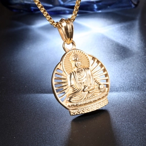 Golden Buddha pendant necklace with a radiant sunburst design and box chain
