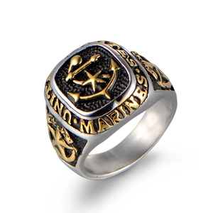 Detailed macro view of US Marines anchor and star relief on vintage steel ring