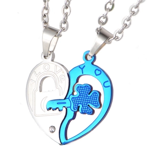 Polished stainless steel couple's necklace set with silver and blue interlocking heart pendants