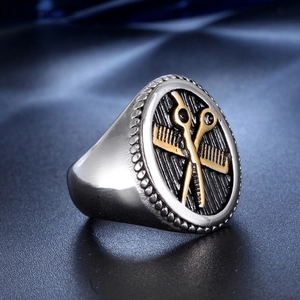 Mens stainless steel ring with gold barber scissors and comb on oval shield