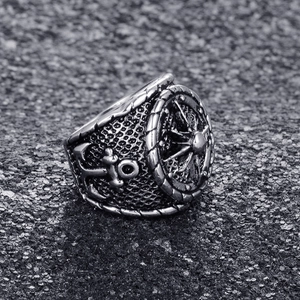 Vintage stainless steel nautical ring for men featuring detailed anchor and helm designs
