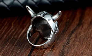 Macro shot of Viking helmet ring back detail with horns and polished steel surface