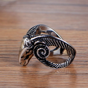 Vintage stainless steel ram head ring for men with detailed punk style spiral horns