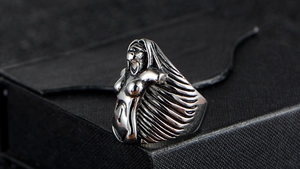 Macro detail of gothic punk stainless steel ring with vintage oxidized finish art