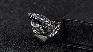 Macro shot of vintage Ganesha stainless steel ring with detailed oxidized finish