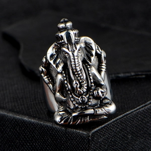 Vintage stainless steel Ganesha ring with oxidized finish and detailed 3D carving