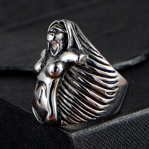 Gothic punk style stainless steel ring with a vintage silver figure design on a black box