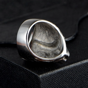 Punk style stainless steel ring for men with vintage polished finish on black leather