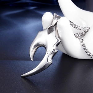 Men's retro gothic wolf fang pendant in polished titanium steel with a clear zircon stone