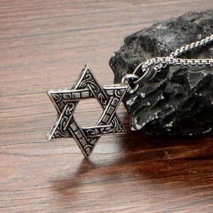 Retro stainless steel Hexagram pendant with box chain on dark natural stone background