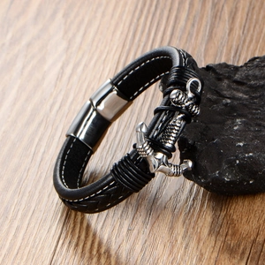 Bracelet pour homme en cuir tressé avec pendentif ancre en acier inoxydable argenté