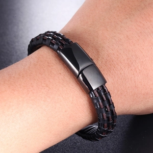 Men's double-row braided leather bracelet with gunmetal magnetic clasp on wrist
