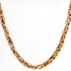Detailed macro view of 316L golden Byzantine titanium steel necklace chain link