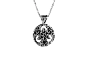 Macro shot of silver Celtic Triquetra knot pendant with striped edges on a chain