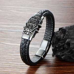Men's punk leather bracelet featuring woven design and engraved silver metal buckle