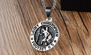 Macro detail of silver Saint Christopher religious pendant with embossed metal finish