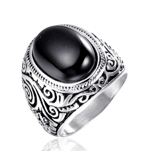 Retro wide-band titanium steel ring with oval black gemstone and vintage relief patterns