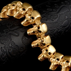 Bracelet pour hommes style punk avec maillons crânes 3D dorés en acier titane poli