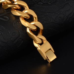 Men's chunky gold-plated titanium cuban link bracelet with industrial box clasp